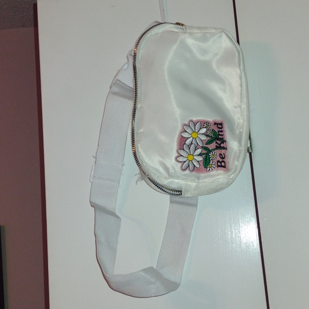 White satin fanny pack with "Be Kind" Daisy patch